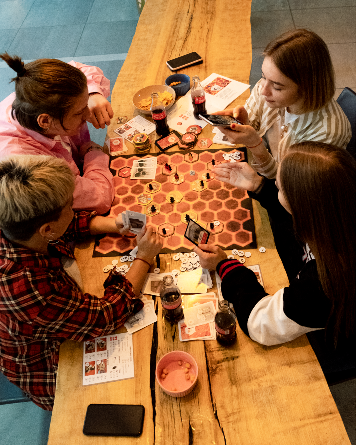 Players enjoying Mars 2050 in a board game café
