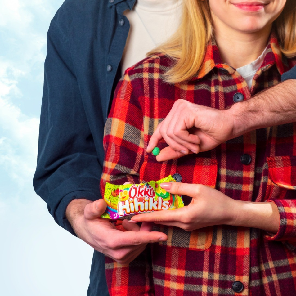 Models sharing Okki candy